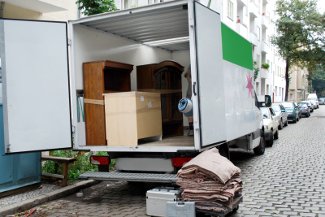 house move van with furniture and tools